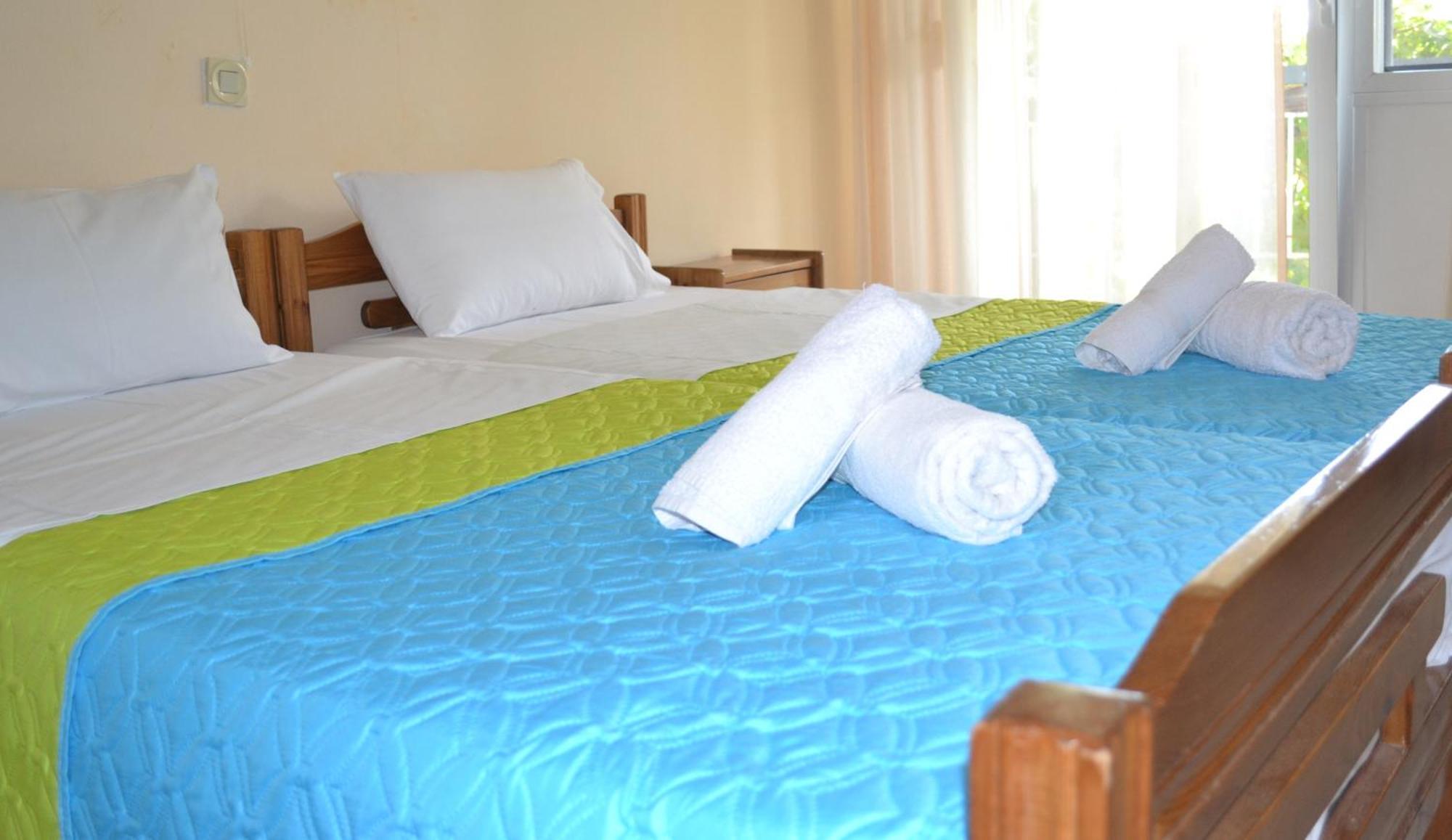 Artemis Apartments Paralia Dionysiou Quarto foto
