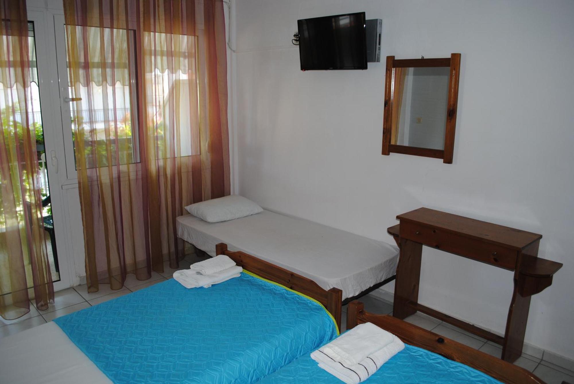 Artemis Apartments Paralia Dionysiou Quarto foto