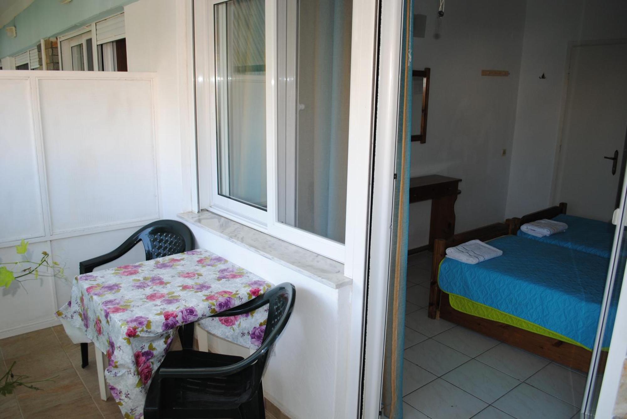 Artemis Apartments Paralia Dionysiou Quarto foto